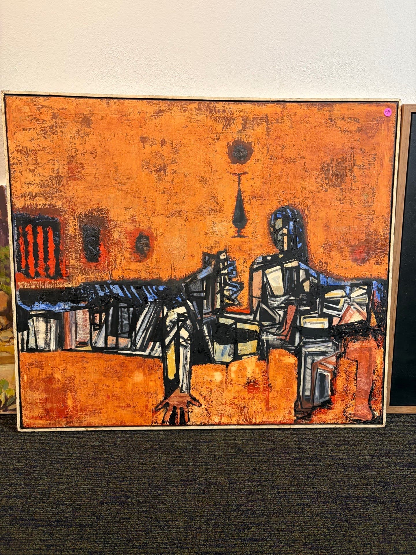 Abstract orange painting with figures